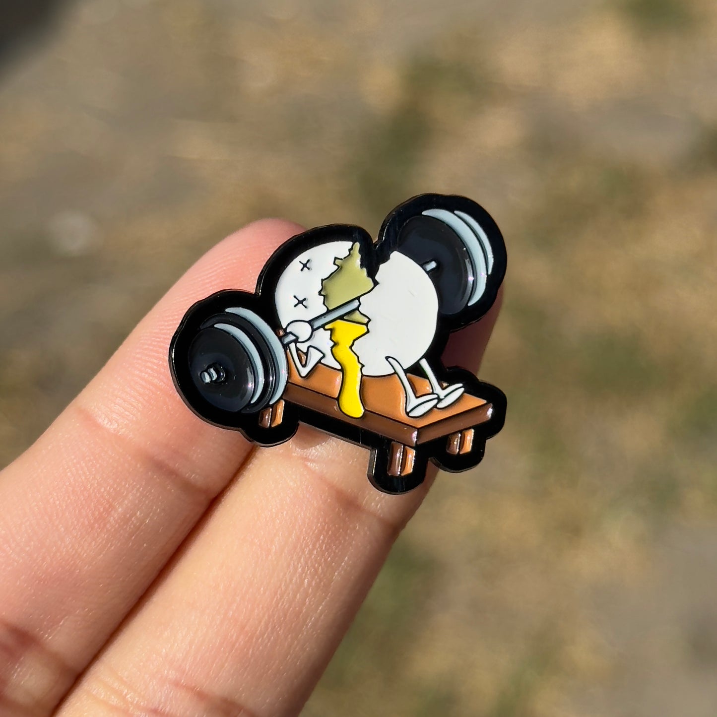Egg weightlifter pin