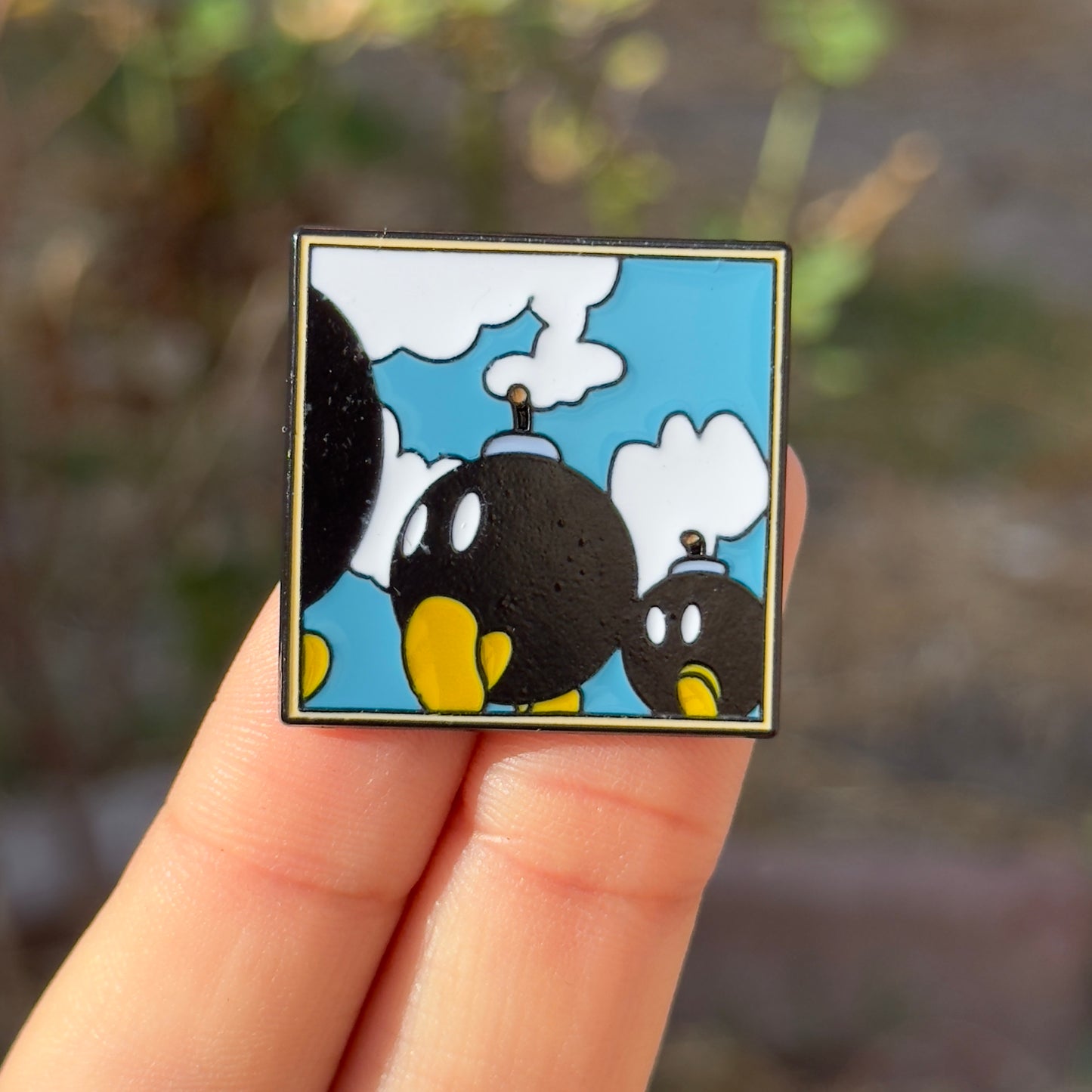Framed Bombs pin