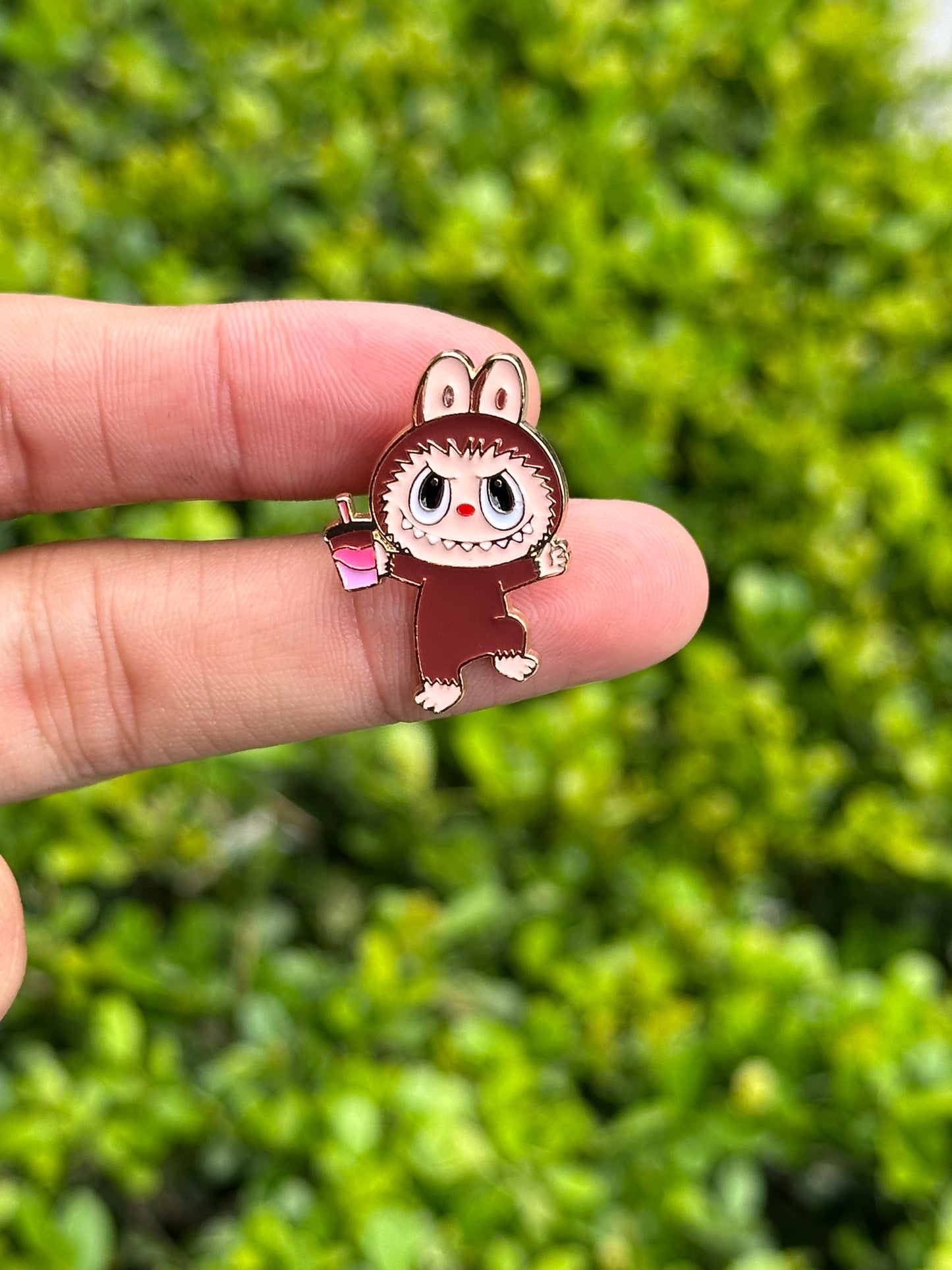 Monster with drink pin