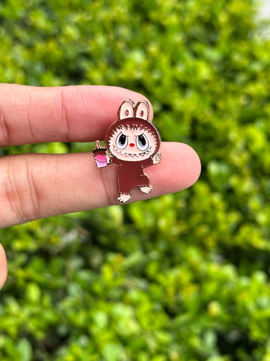 Monster with drink pin