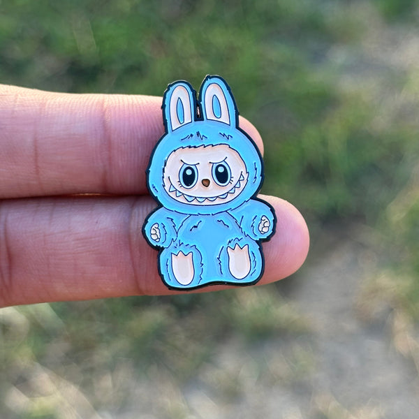 Sitting blue Monster pin